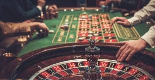 Adventures Beyond Wonderland studio interior with live Andar Bahar and Teen Patti tables